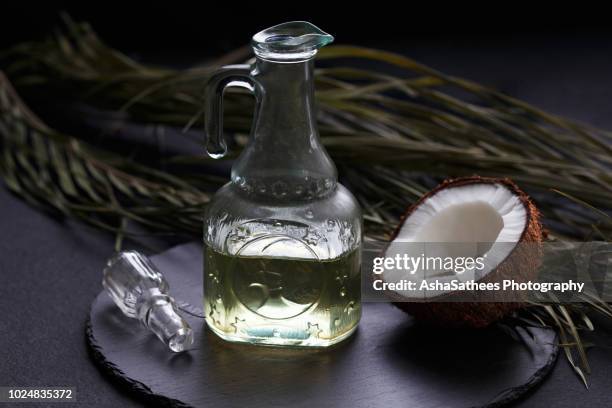 coconut oil - kokosnussöl stock-fotos und bilder