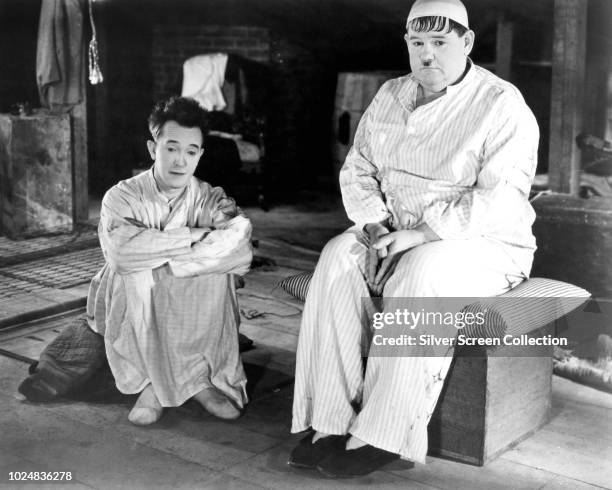 Comedy duo Stan Laurel and Oliver Hardy in a scene from the comedy film 'Sons of the Desert', 1933.