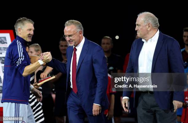 Sebastian Schweinsteiger of Chicago shake hands with Karl Heinz Rummenigge, CEO of Bayern Muenchen before the Friendly Match between FC Bayern...