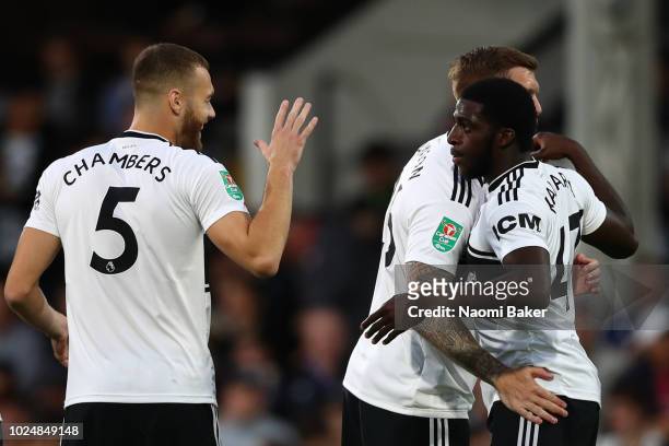 Aboubakar Kamara of Fulham celebrates with his team mates after scoring his team's first goal during the Carabao Cup Second Round match between...