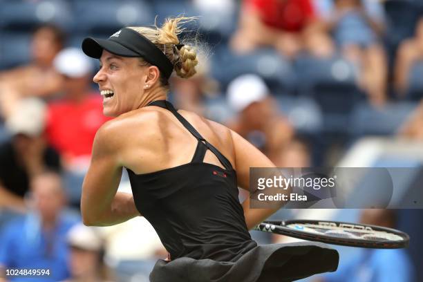 Angelique Kerber of Germany returns the ball during her women's singles first round match against Margarita Gasparyan of Russia on Day Two of the...