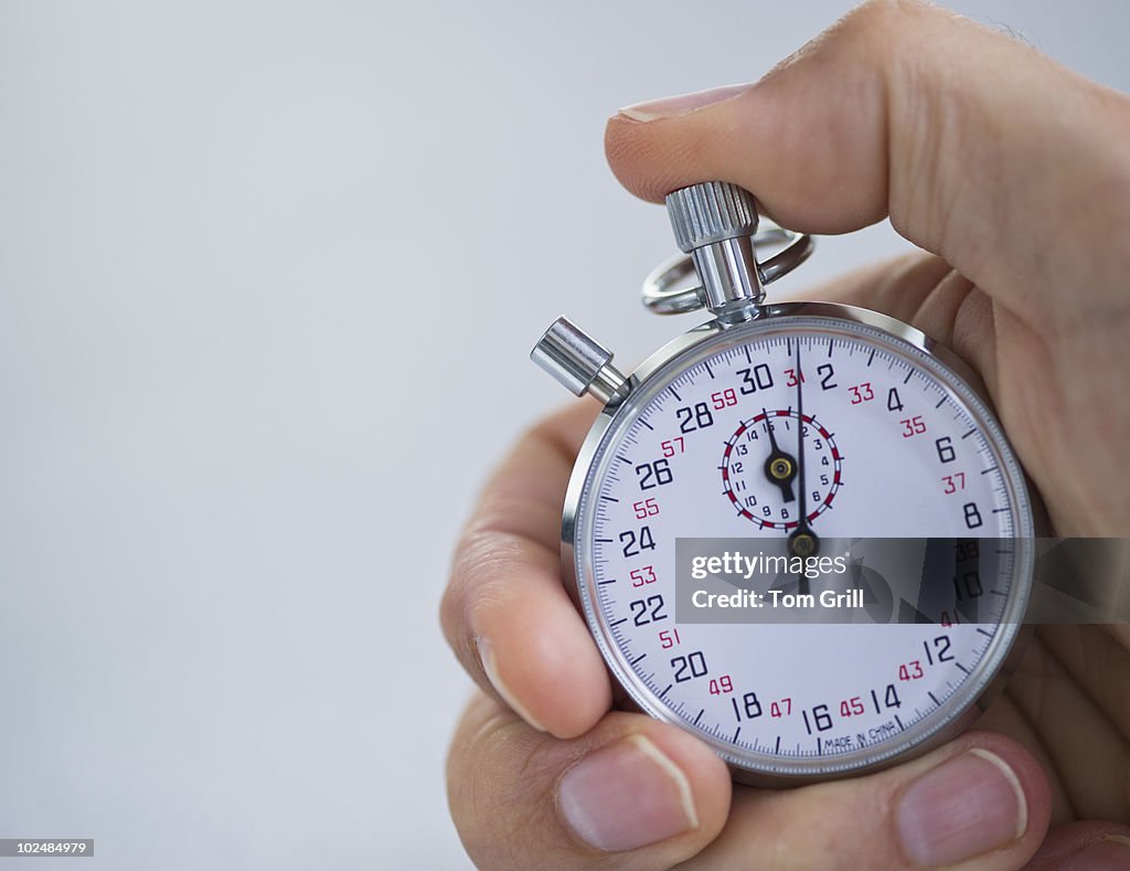 Hand with stopwatch