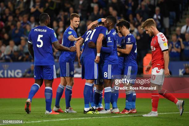 Vicente Iborra of Leicester City celebrates with team mates after scoring his team's second goal during the Carabao Cup Second Round match between...