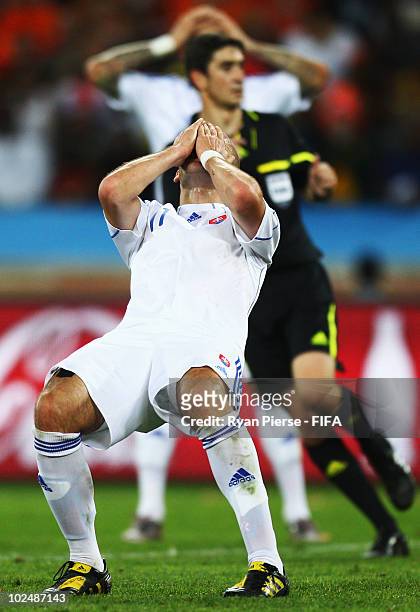 Robert Vittek of Slovakia reacts after he misses a goal scoring chance during the 2010 FIFA World Cup South Africa Round of Sixteen match between...