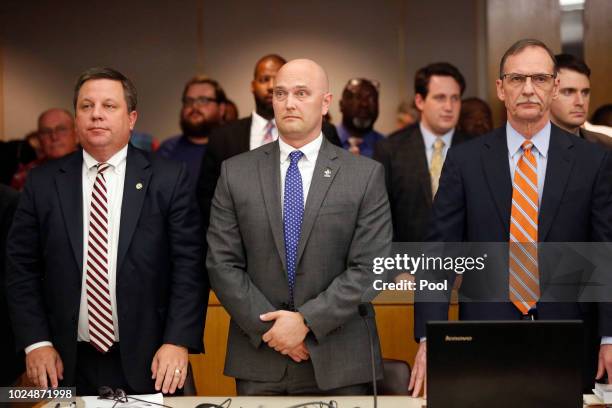 Fired Balch Springs police officer Roy Oliver and attorneys Miles Brissette and Bob Gill stand before the reading of the verdict on the ninth day of...