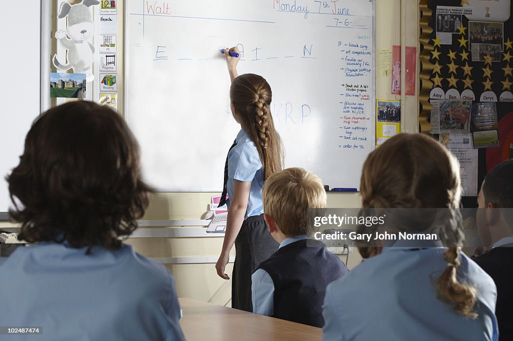 Young student at front of class