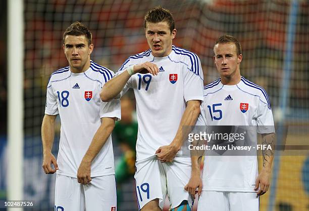 Erik Jendrisek, Juraj Kucka and Miroslav Stoch of Slovakia line up in a wall during the 2010 FIFA World Cup South Africa Round of Sixteen match...