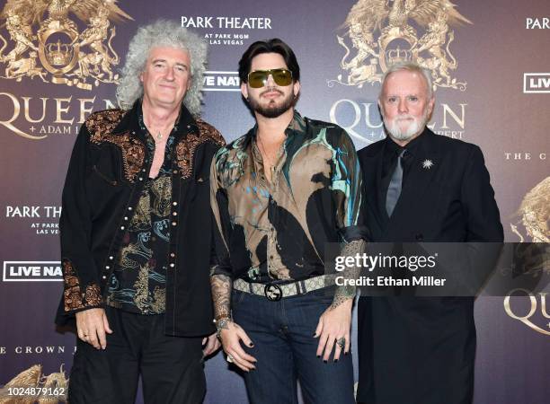 Guitarist Brian May, singer Adam Lambert and drummer Roger Taylor of Queen + Adam Lambert pose after a news conference at the MGM Resorts aviation...