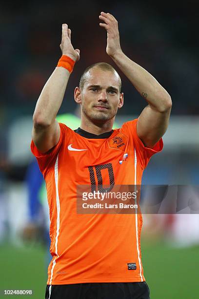Wesley Sneijder of the Netherlands celebrates victory following the 2010 FIFA World Cup South Africa Round of Sixteen match between Netherlands and...