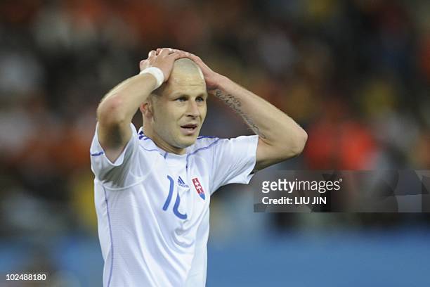 Slovakia's midfielder Marek Sapara reacts during the 2010 World Cup round of 16 football match Netherlands versus Slovakia on June 28, 2010 at Moses...
