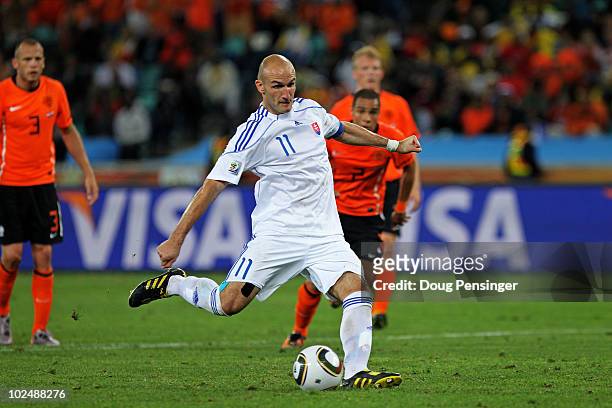 Robert Vittek of Slovakia shoots and scores a late penalty during the 2010 FIFA World Cup South Africa Round of Sixteen match between Netherlands and...