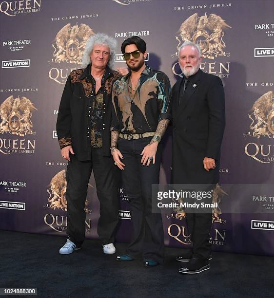 Guitarist Brian May, singer Adam Lambert and drummer Roger Taylor of Queen + Adam Lambert pose at the MGM Resorts aviation hangar to kick off the...