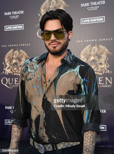 Singer Adam Lambert of Queen + Adam Lambert poses at the MGM Resorts aviation hangar to kick off the group's 10-date limited engagement, "The Crown...