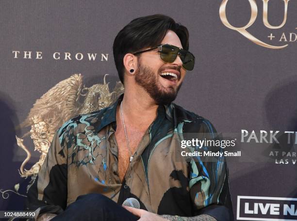 Singer Adam Lambert of Queen + Adam Lambert attends a news conference at the MGM Resorts aviation hangar to kick off the group's 10-date limited...