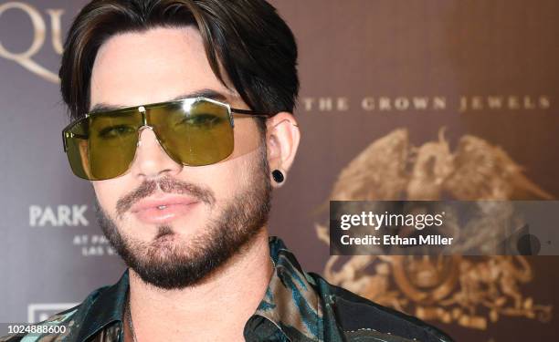 Singer Adam Lambert of Queen + Adam Lambert poses after a news conference at the MGM Resorts aviation hangar to kick off the group's 10-date limited...