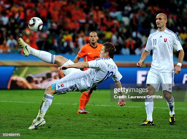 Juraj Kucka of Slovakia attempts an overhead kick during the 2010 FIFA World Cup South Africa Round of Sixteen match between Netherlands and Slovakia...