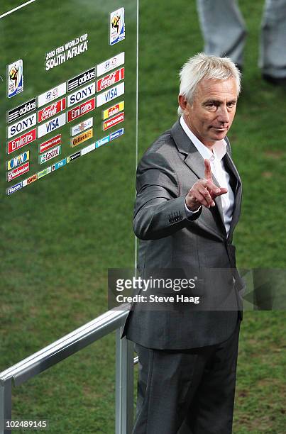 Bert van Marwijk head coach of the Netherlands celebrates victory following the 2010 FIFA World Cup South Africa Round of Sixteen match between...