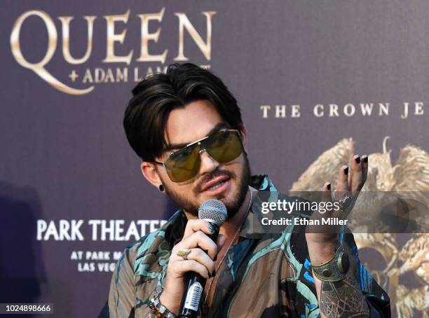 Singer Adam Lambert of Queen + Adam Lambert speaks during a news conference at the MGM Resorts aviation hangar to kick off the group's 10-date...