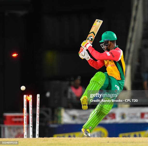 In this handout image provided by CPL T20, Shimron Hetmyer of Guyana Amazon Warriors is bowled by Carlos Brathwaite of St Kitts & Nevis Patriots...