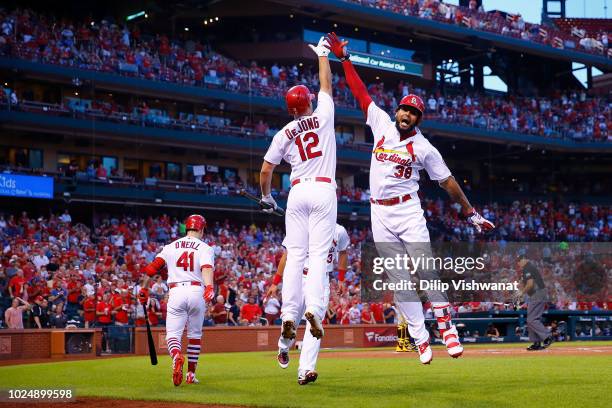 Jose Martinez of the St. Louis Cardinals celebrates after hitting a two-run home run against the Pittsburgh Pirates in the first inning at Busch...