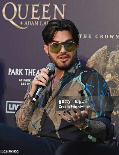 Singer Adam Lambert of Queen + Adam Lambert speaks during a news conference at the MGM Resorts aviation hangar to kick off the group's 10-date...