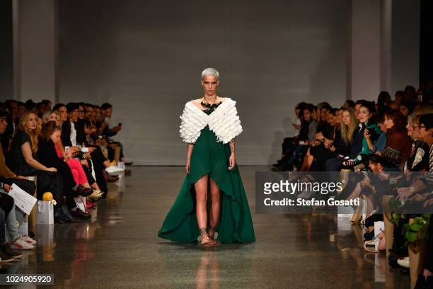 Model walks the runway during the Kiri Nathan show during New Zealand Fashion Week 2018 at Viaduct Events Central on August 29, 2018 in Auckland, New...
