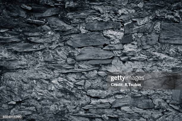 wall of stones as a texture for background - muro fortificado imagens e fotografias de stock