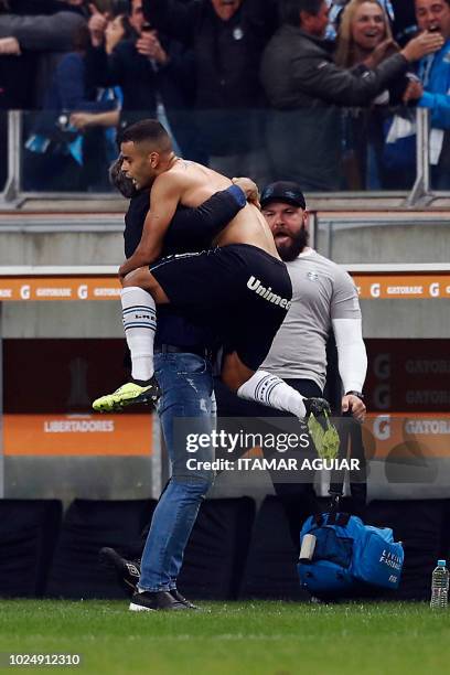 Alisson of Brazil's Gremio, celebrates after scoring against Argentina's Estudiantes, during their Copa Libertadores 2018 football match held at the...