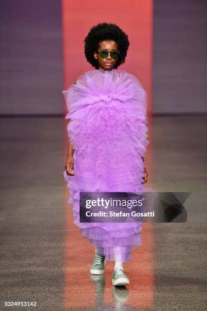 Model walks the runway in a design by Havilah during the New Generation show during New Zealand Fashion Week 2018 at Viaduct Events Centre on August...