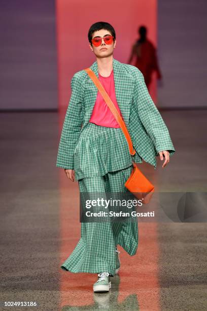 Model walks the runway in a design by Havilah during the New Generation show during New Zealand Fashion Week 2018 at Viaduct Events Centre on August...