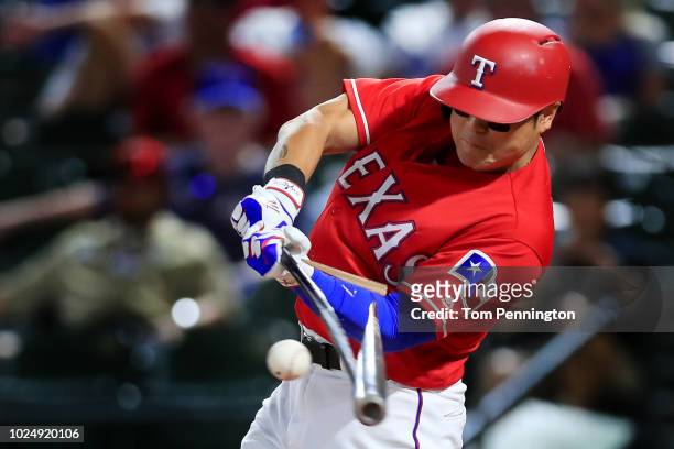 Shin-Soo Choo of the Texas Rangers hits a broken bat ground out against the Los Angeles Dodgers in the bottom of the ninth inning at Globe Life Park...