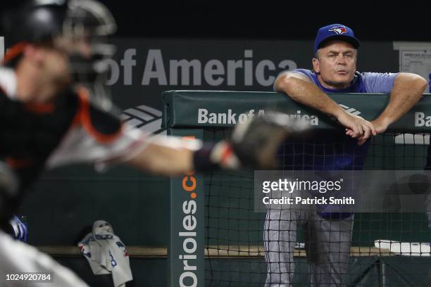 Manager John Gibbons of the Toronto Blue Jays looks on against the Baltimore Orioles at Oriole Park at Camden Yards on August 28, 2018 in Baltimore,...