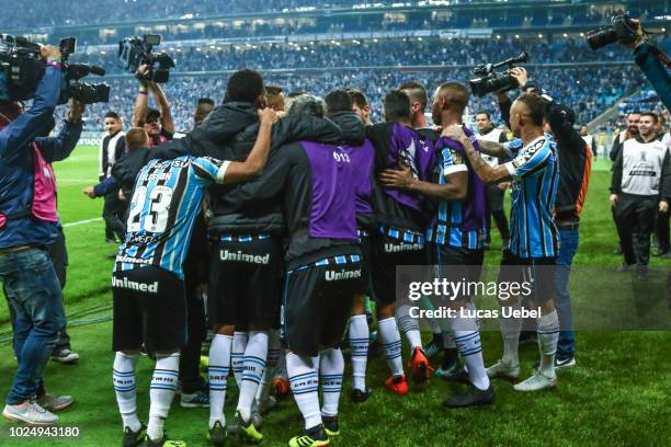 Players of Gremio celebrate after winning the match between Gremio and Estudiantes, part of Copa Conmebol Libertadores 2018, at Arena do Gremio on...