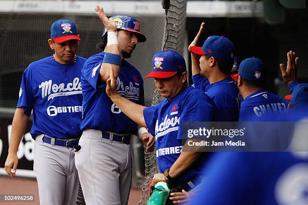 Players of the Acereros de Monclova celebrate during a 2010 Liga Mexicana de Beisebol match against Diablos Rojos del Mexico at the Foro Sol Stadium...