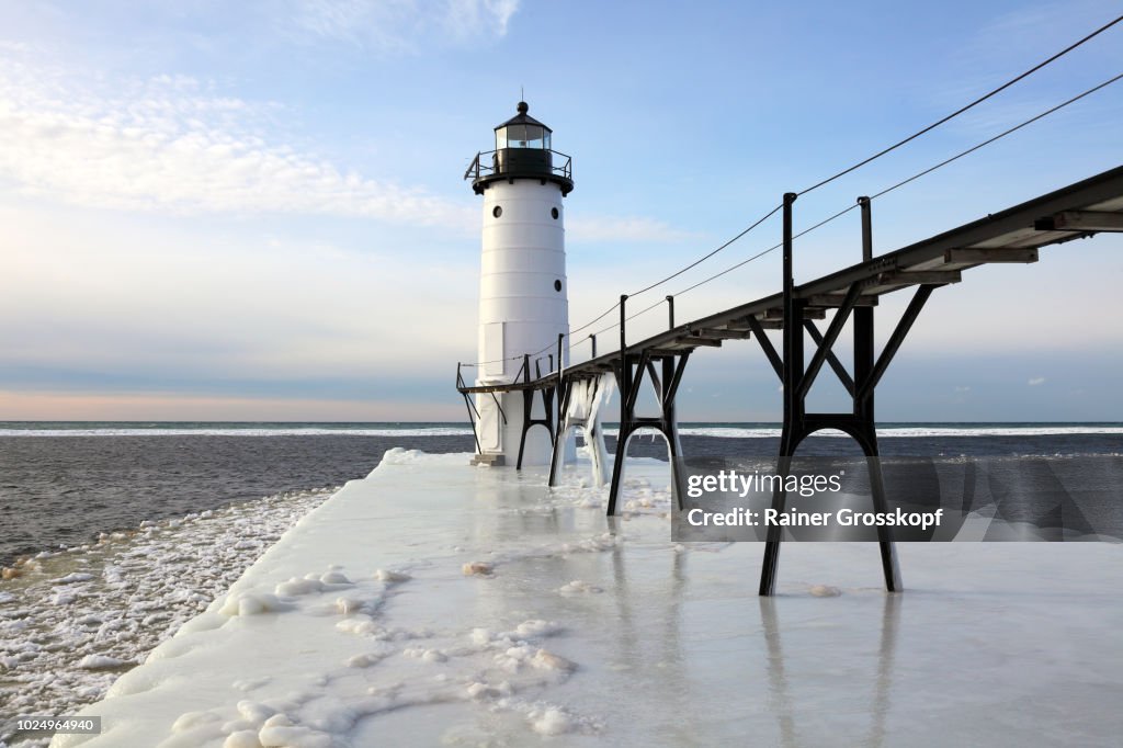 Lighthouse on Lake Michigan in winter