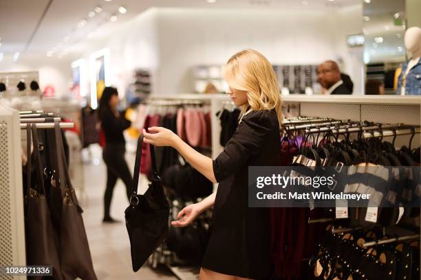 Lili Reinhart attends the new H&M Westfield Century City opening at Century City Mall on August 28, 2018 in Century City, California.