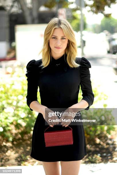 Lili Reinhart attends the new H&M Westfield Century City opening at Century City Mall on August 28, 2018 in Century City, California.