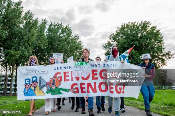 People protest in Groningen, Netherlands on August 28, 2018 against the fossil fuel industry. Besides the Code Rood civil disobedience action, a...