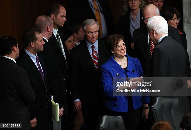 Supreme Court Justice nominee Elena Kagan shakes hands with Sen. John Cornyn as she arrives with Jeff Sessions , ranking member of the Senate...