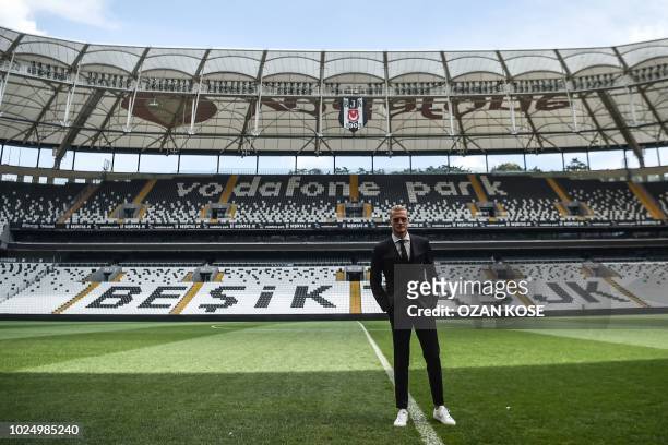 German goalkeeper Loris Karius poses on the football picth of the Vodafone Park Stadium, on August 29, 2018 after his presentation, in Istanbul. -...