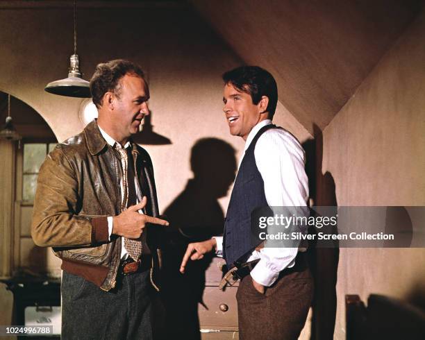 Actors Warren Beatty as Clyde Barrow and Gene Hackman as Buck Barrow in the film 'Bonnie and Clyde', 1967.