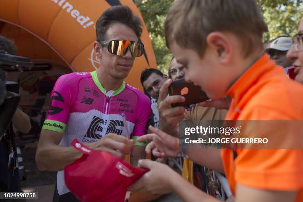 Team EF Education First - Drapac P/B Cannondale's Colombian cyclist Rigoberto Uran signs autographs before the start of the fifth stage of the 73rd...