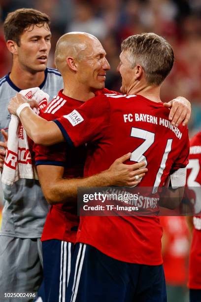 Arjen Robben of Bayern Muenchen shakes hands with Bastian Schweinsteiger of Chicago Fire during the friendly match between FC Bayern Muenchen and...