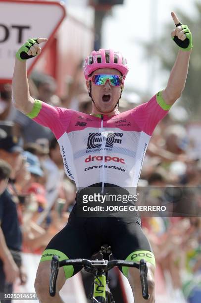 Education First-Drapac's Australian cyclist Simon Clarke celebrates as he crosses the finish line, winning the fifth stage of the 73rd edition of "La...