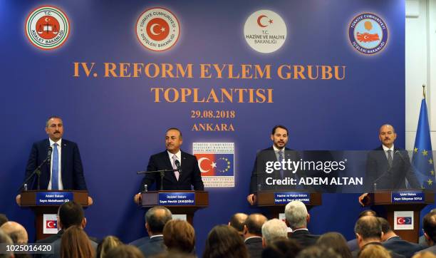 Turkish Justice Minister Abdulhamit Gul, Turkish Foreign Minister Mevlut Cavusoglu, Treasury and Finance Minister Berat Albayrak and Turkish Interior...