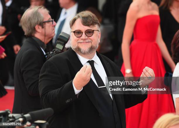 Jury President Guillermo Del Toro walks the red carpet ahead of the opening ceremony and the 'First Man' screening during the 75th Venice Film...