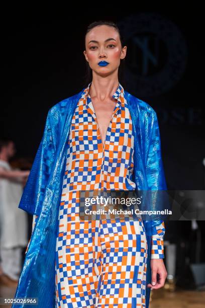 Model walks the runway at the Naim Josefi show during Stockholm Runway SS19 at Grand Hotel on August 29, 2018 in Stockholm, Sweden.