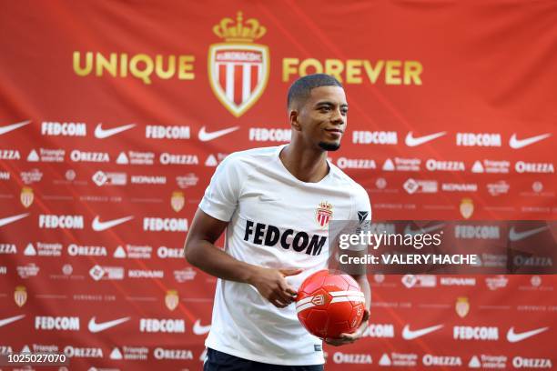 Monaco's newly recruited German defender Benjamin Henrichs poses during a photo session as part of his official presentation on August 29 at the...