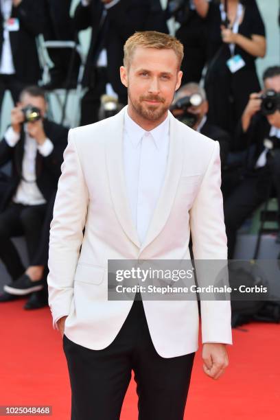 Actor Ryan Gosling walks the red carpet ahead of the opening ceremony and the 'First Man' screening during the 75th Venice Film Festival at Sala...