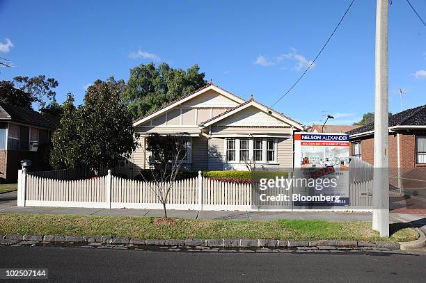 Sticker has been added to a sign advertising a house for sale in Coburg, a northern suburb of Melbourne, Australia, on Monday, June 28, 2010. A...